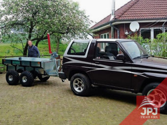 multifunctional trailer profi worker behind SUV